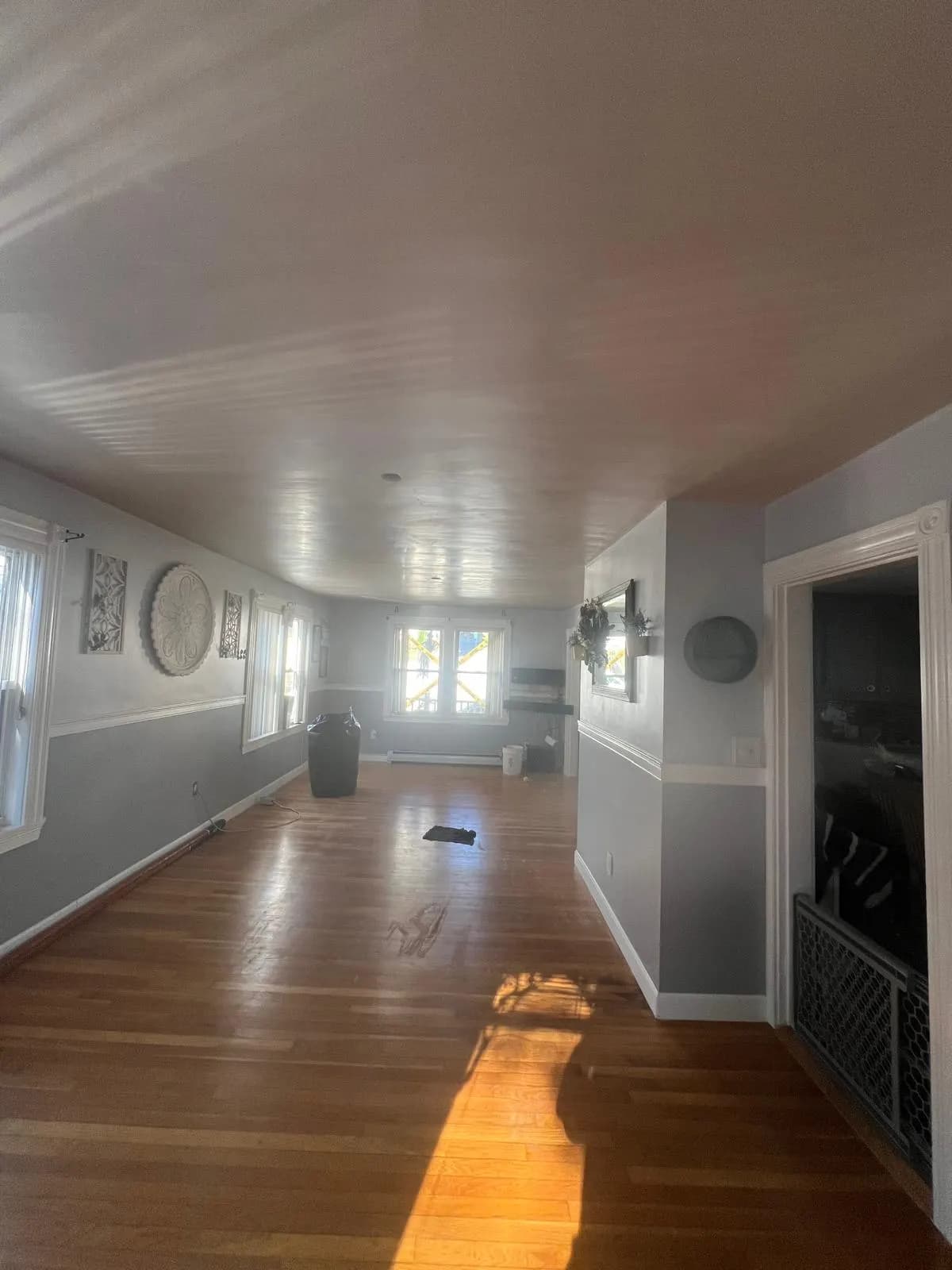A smooth finished ceiling after popcorn texture removal